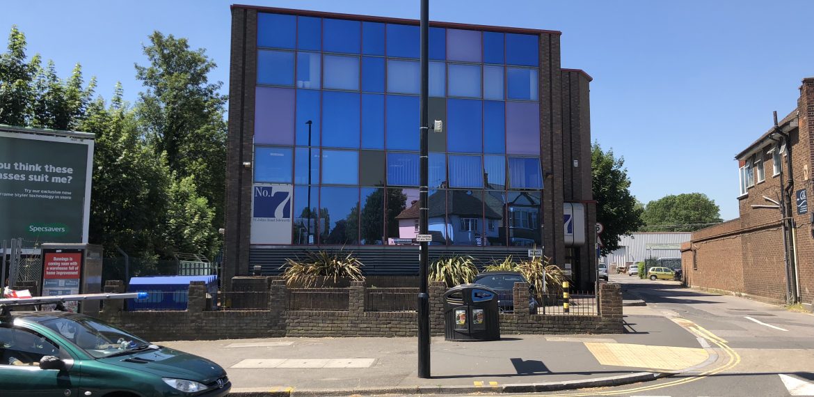 Coomb House in Isleworth before conversion: 1970s glazed office building